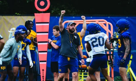 LB coach Andrew Warwick's decision to join WVU was no-brainer, trying to instill history of program in players